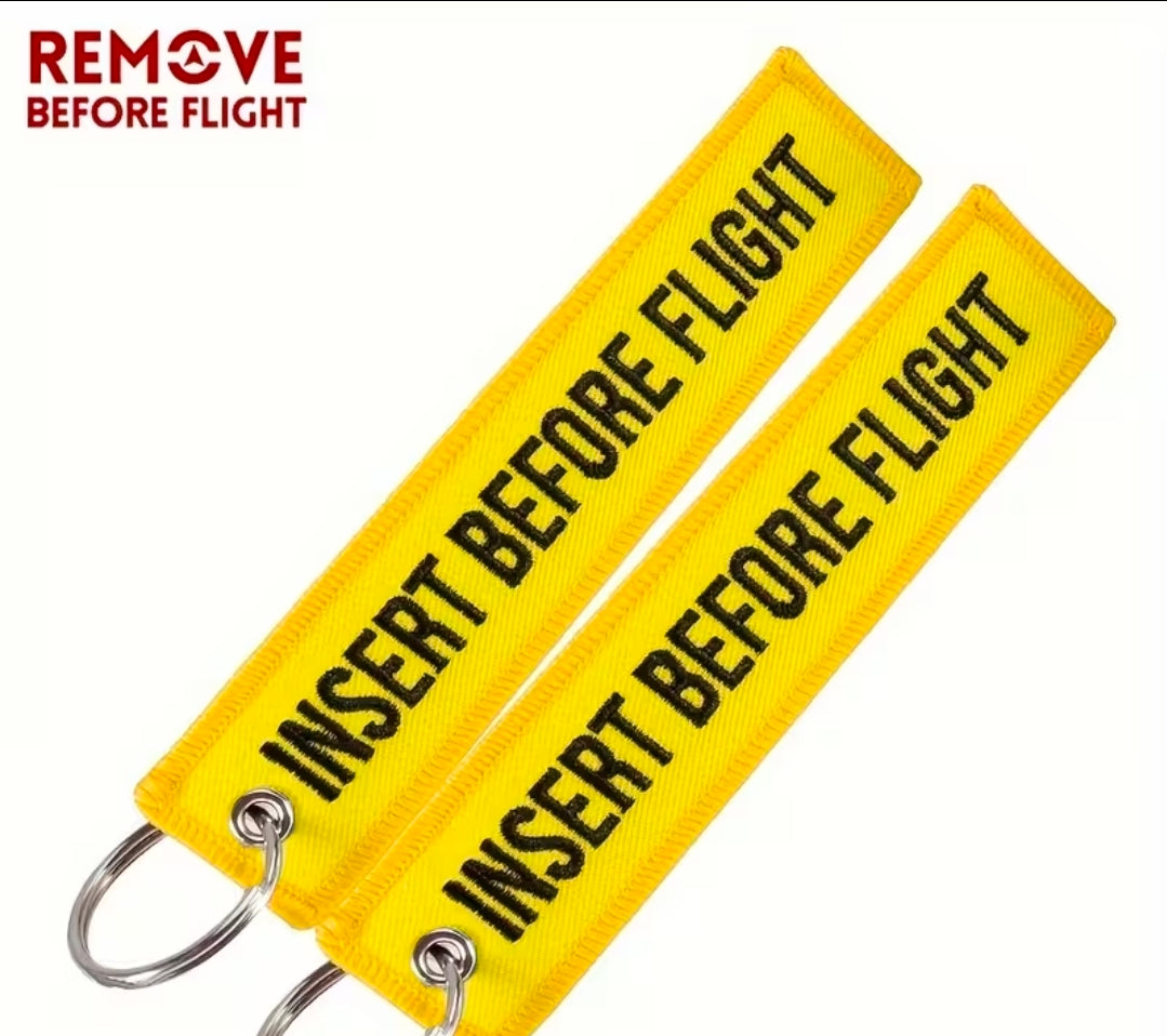 Insert Before Flight Nyckelring