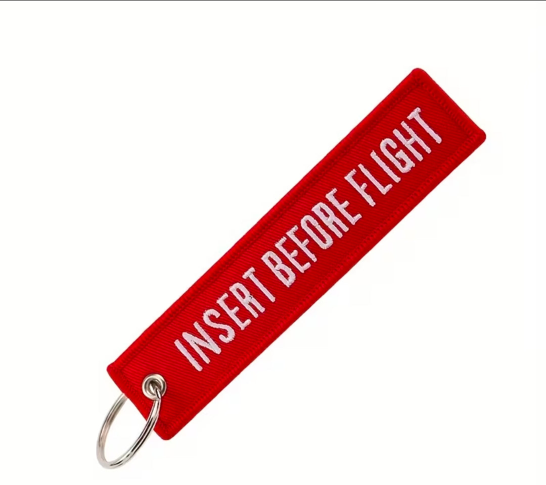 Insert Before Flight Nyckelring